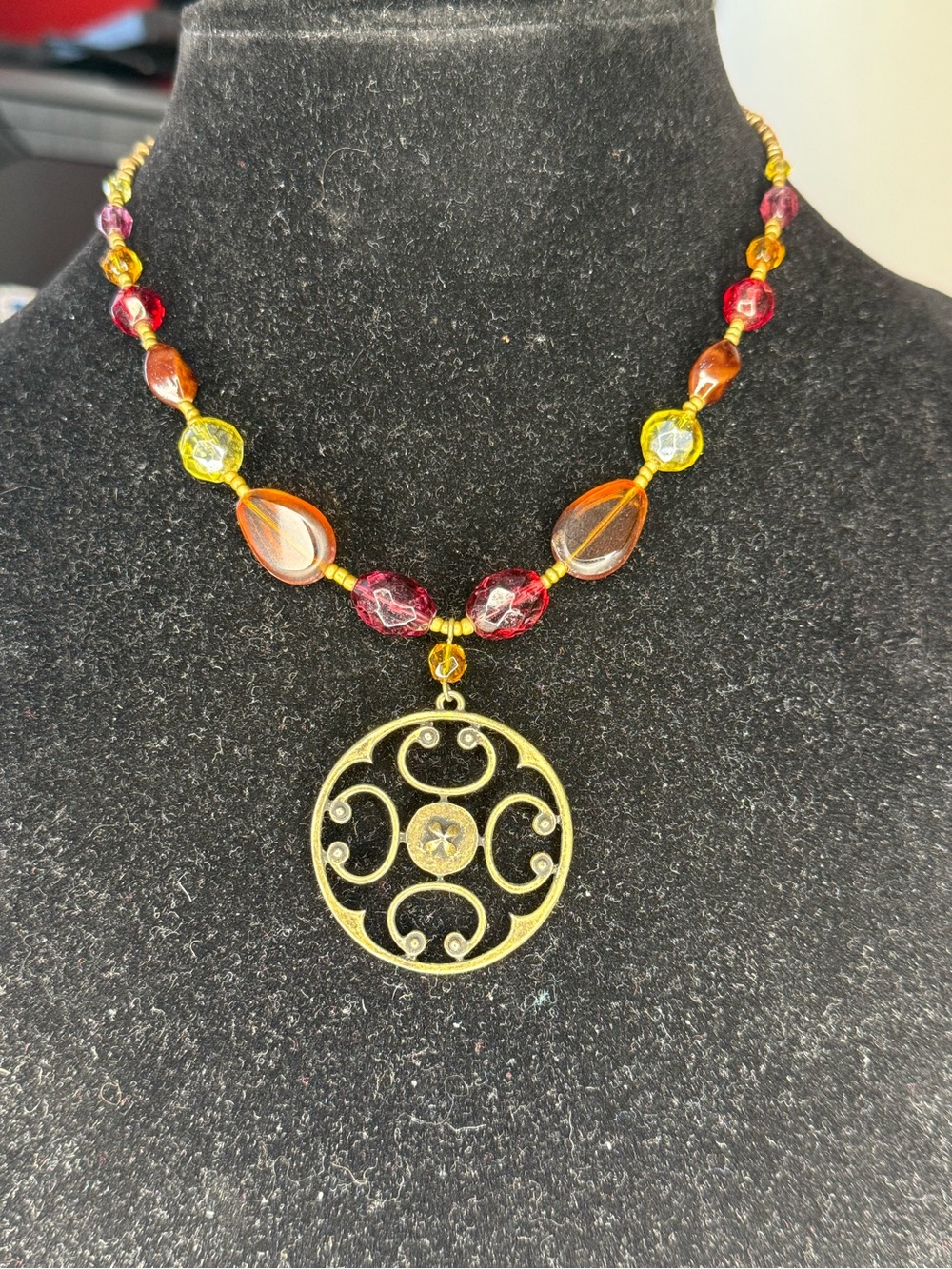 Cookie Lee Gold-Tone Filigree Pendant Necklace with Red, Amber and Yellow Beads